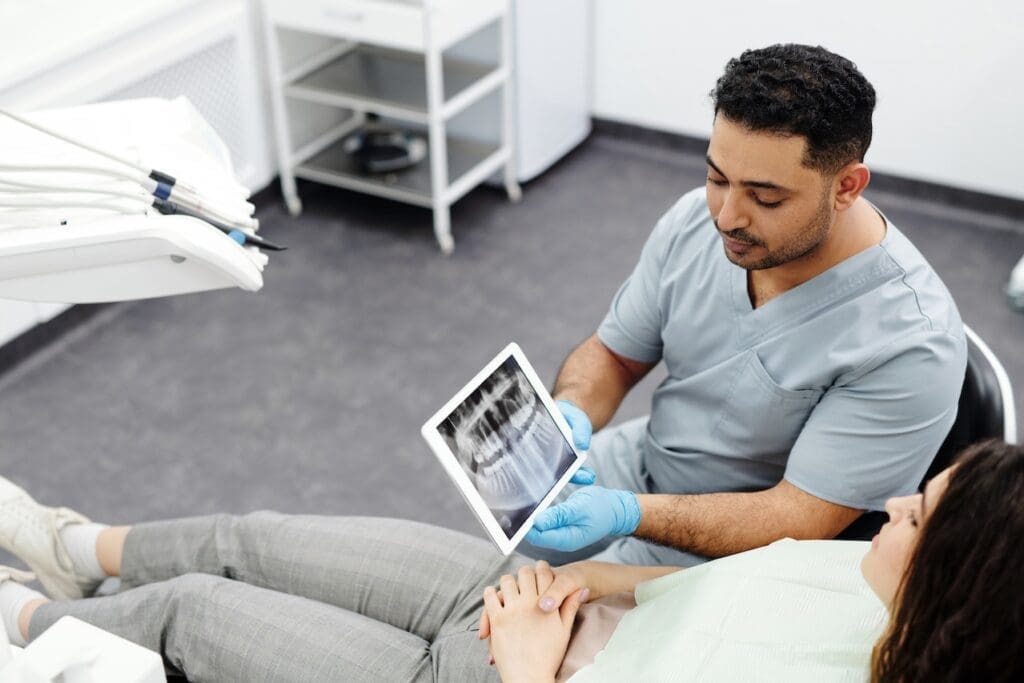 man explaining to a patient