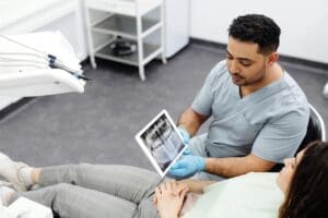 man explaining to a patient