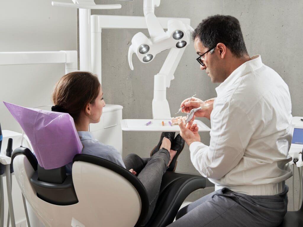 dentist explaining to patient