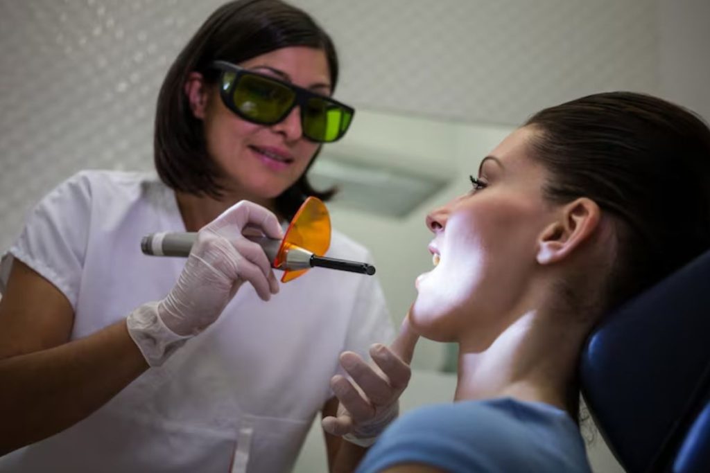 woman receiving smile laser eye treatment